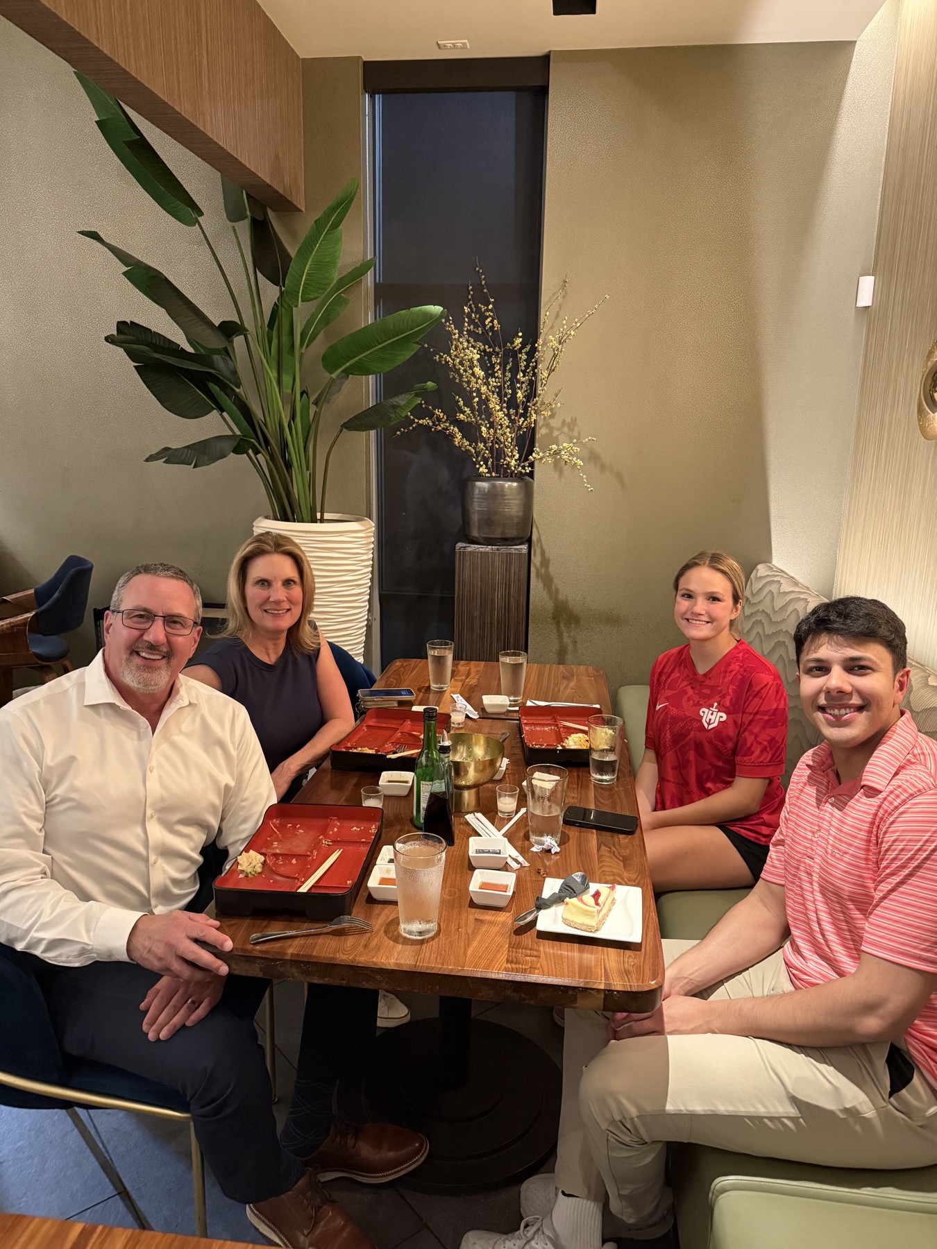 Abid Khan (right) out to dinner with Dr. Levy and his family