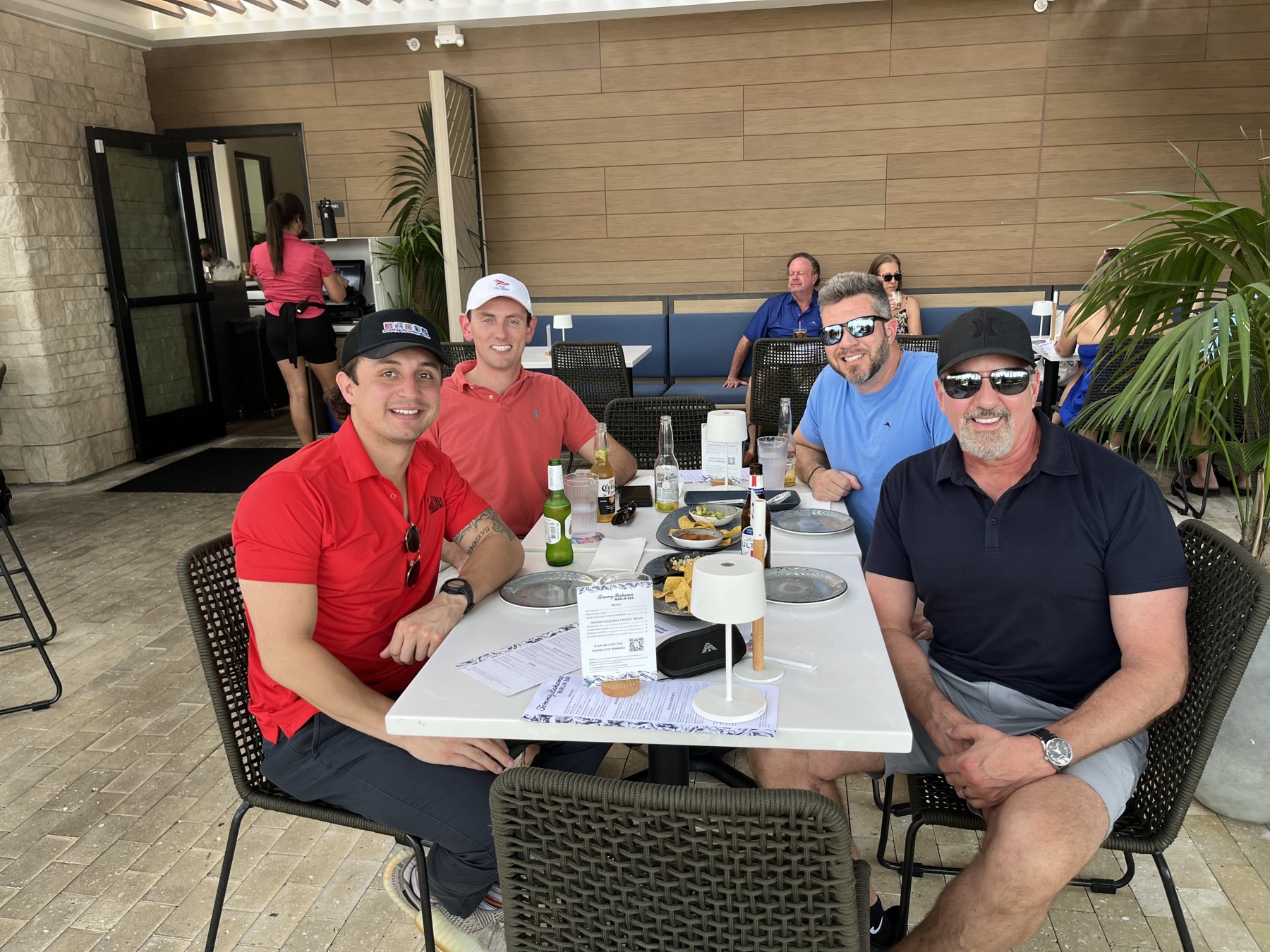 Adam Daniel (left) at brunch with Dr. Levy and friends.